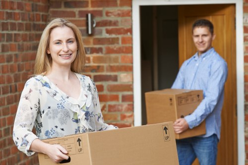 People safely moving items in a clean storage facility
