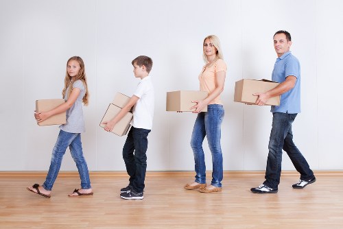 Packed boxes and moving van for Enfieldlock removals